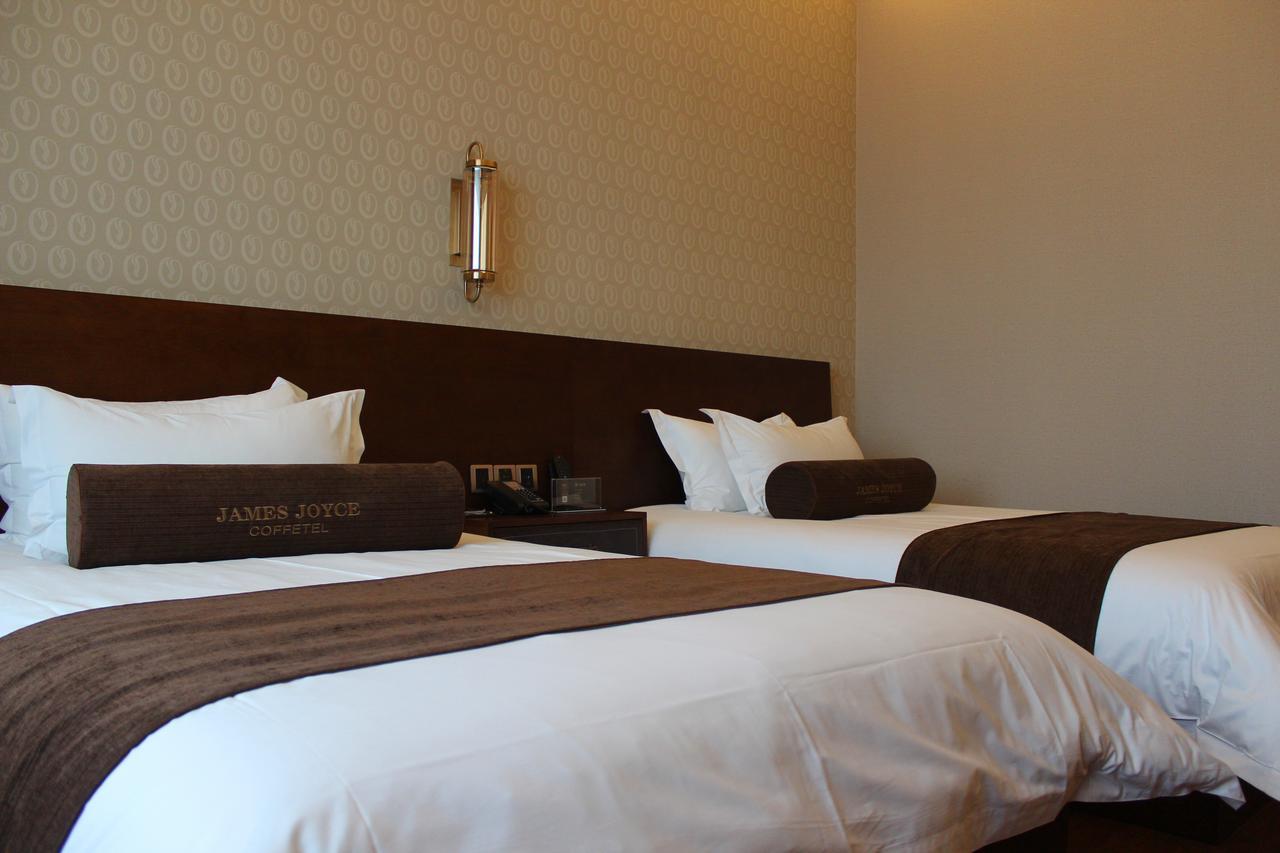 เจมส์ จอยซ์ คอฟฟีเทล สถาบันเทคโนโลยี ฮาร์บิน Hotel ภายนอก รูปภาพ
