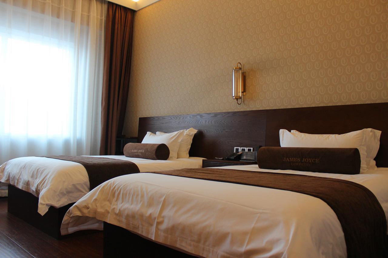 เจมส์ จอยซ์ คอฟฟีเทล สถาบันเทคโนโลยี ฮาร์บิน Hotel ภายนอก รูปภาพ